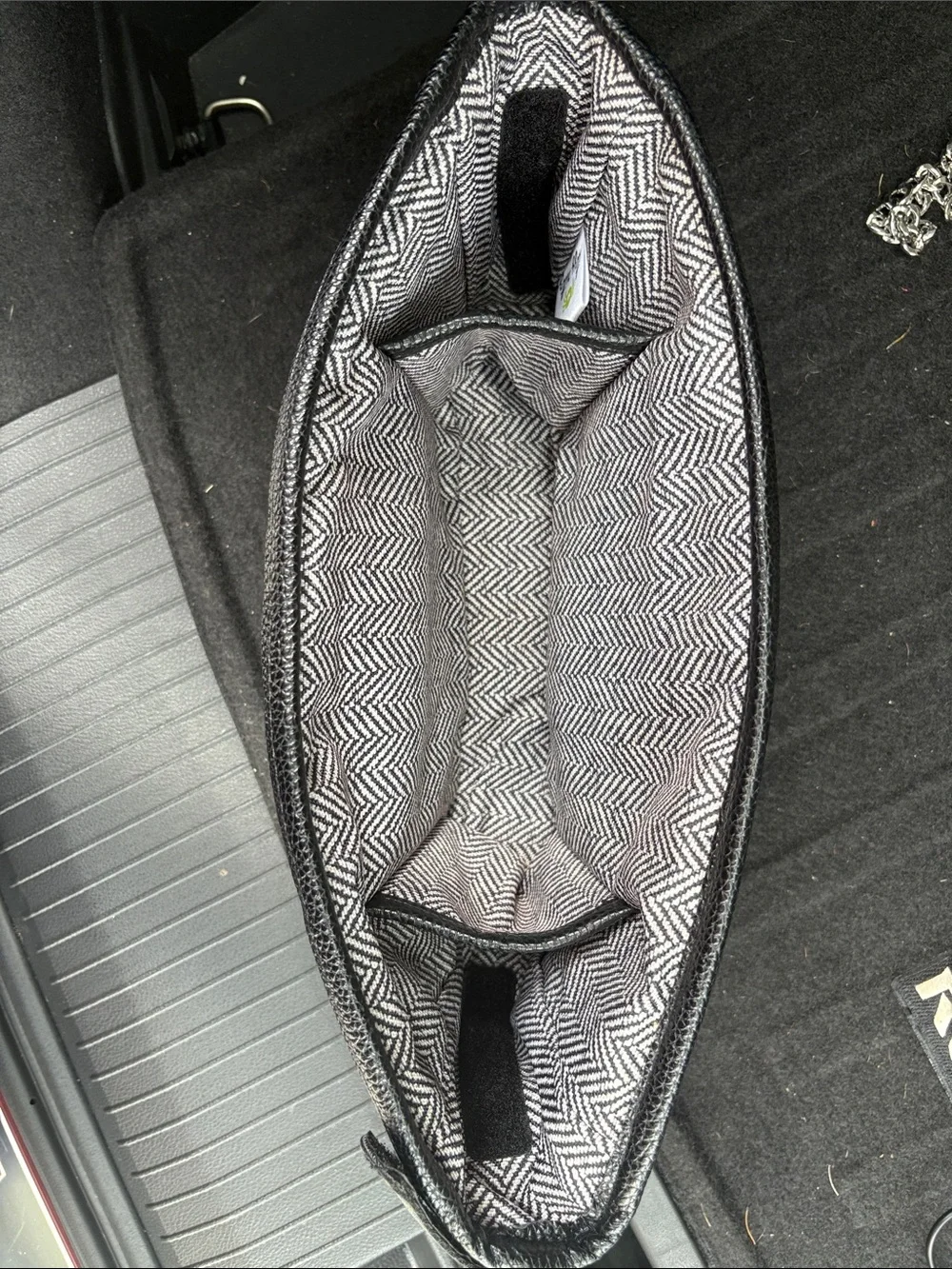 The Itzy Ritzy Adjustable Stroller Caddy and Organizer Bag